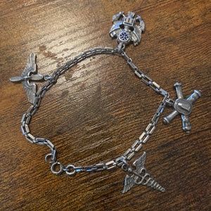 4 charm silver bracelet